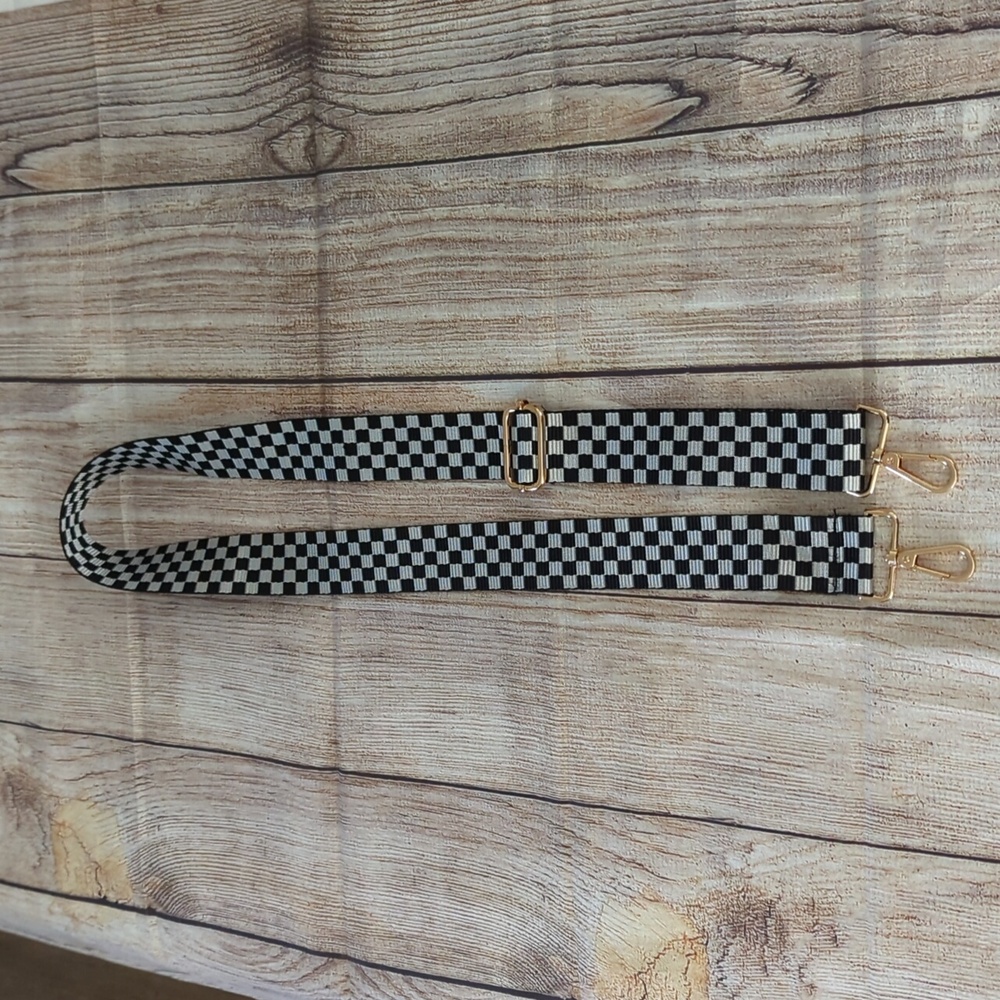 Adjustable black and white checkered crossbody strap